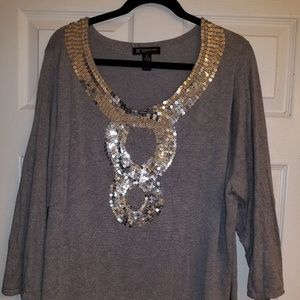 Grey sweater with silver sequined design